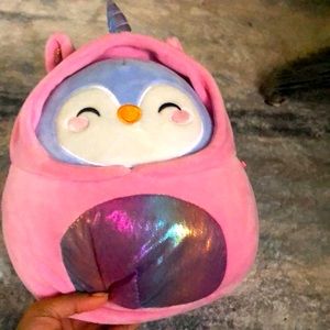 I am selling a penguin squish mellow with a unicorn hoodie.